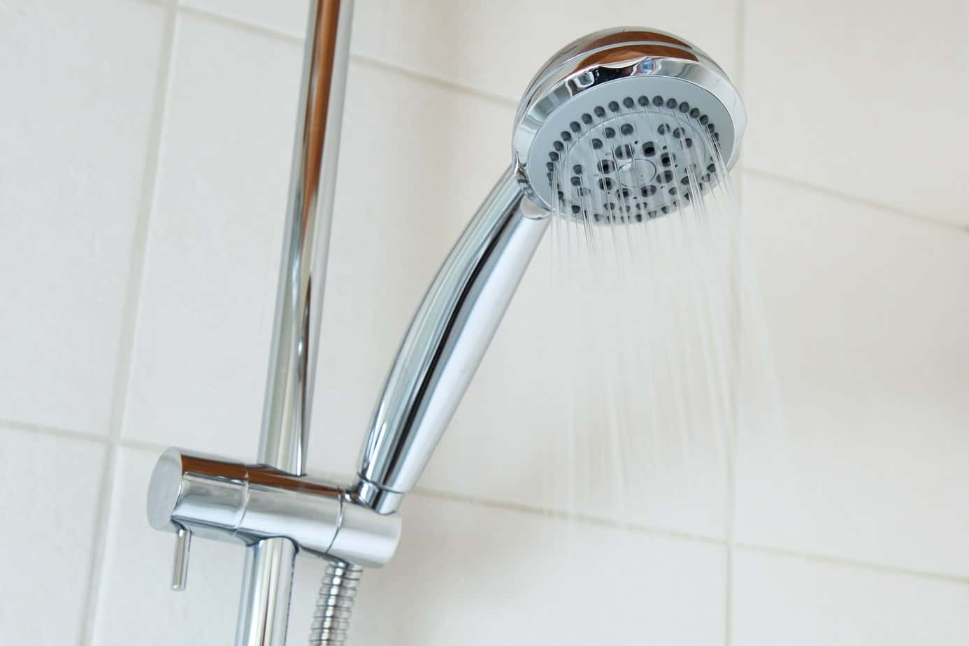 why shower head whistles