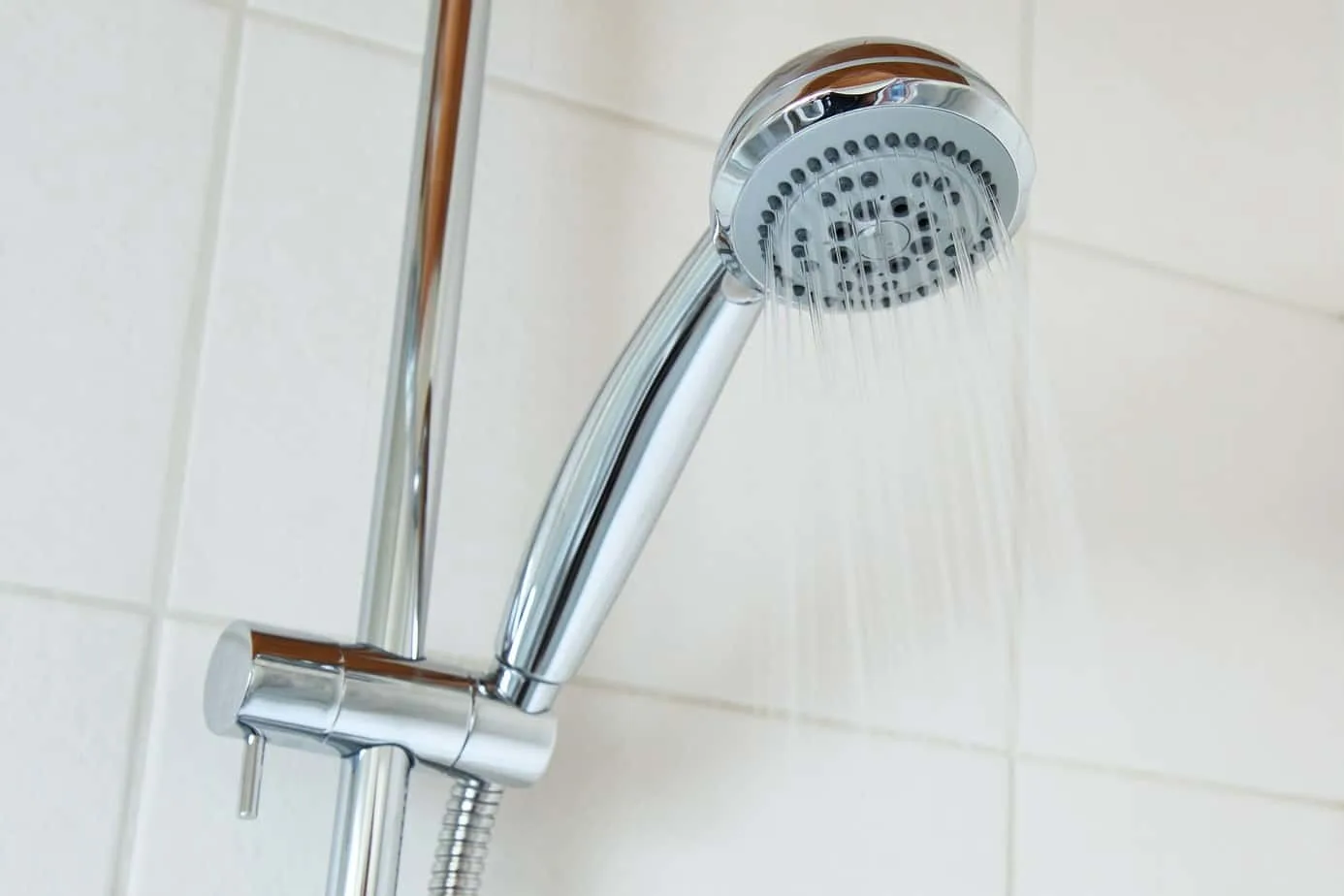 why shower head whistles